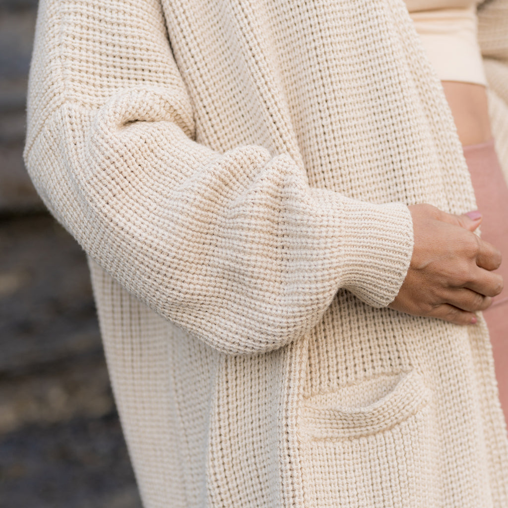 Sleeve detail of Sakti Rising cozy knit cardigan. Ethical, sustainable apparel made in Indonesia.