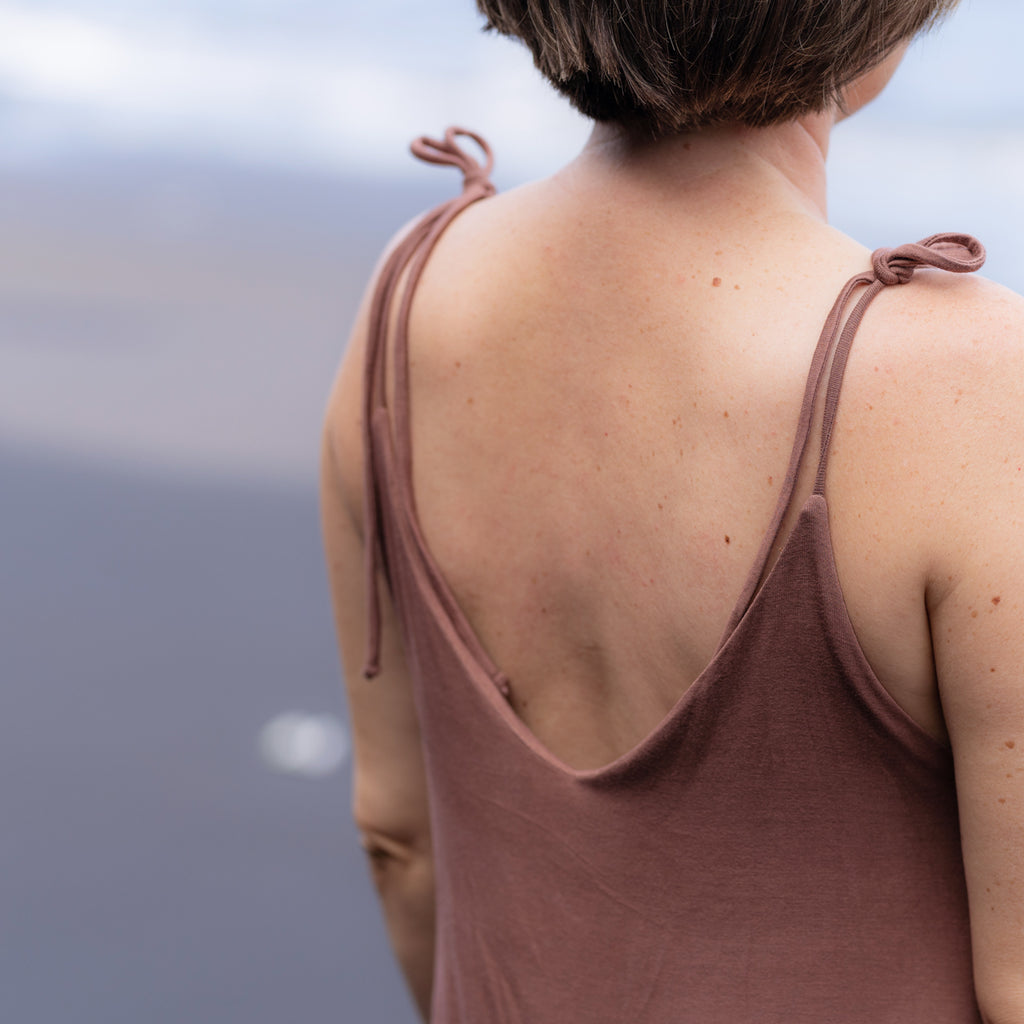 Detail of Sakti Rising Parvati Playsuit in Cacao. Sustainable, ethical yoga clothing.